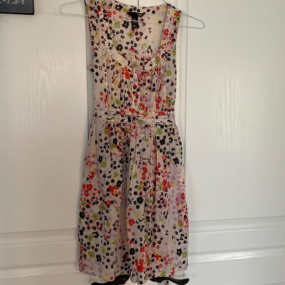 Cute white dress with black and red specks.  Shiny red little buttons - Picture 1 of 3